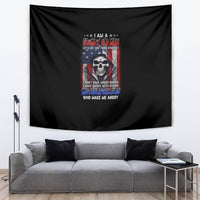 Black tapestry wall hanging with central skull illustration and colorful slogan text
