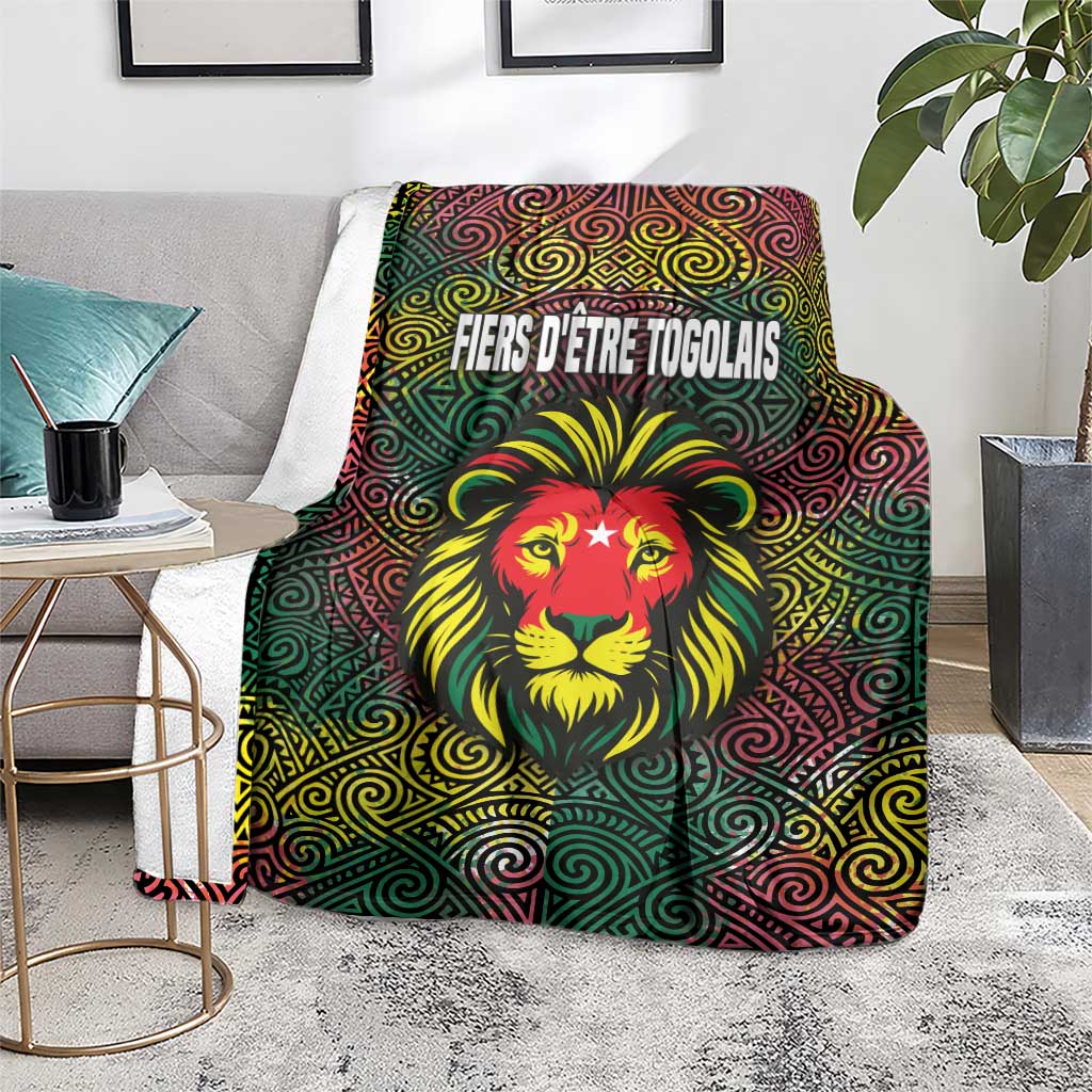 Togo blanket featuring a red lion head and multicolor spiral design