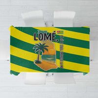 Multicolor tablecloth with green and yellow stripes and palm tree ocean design