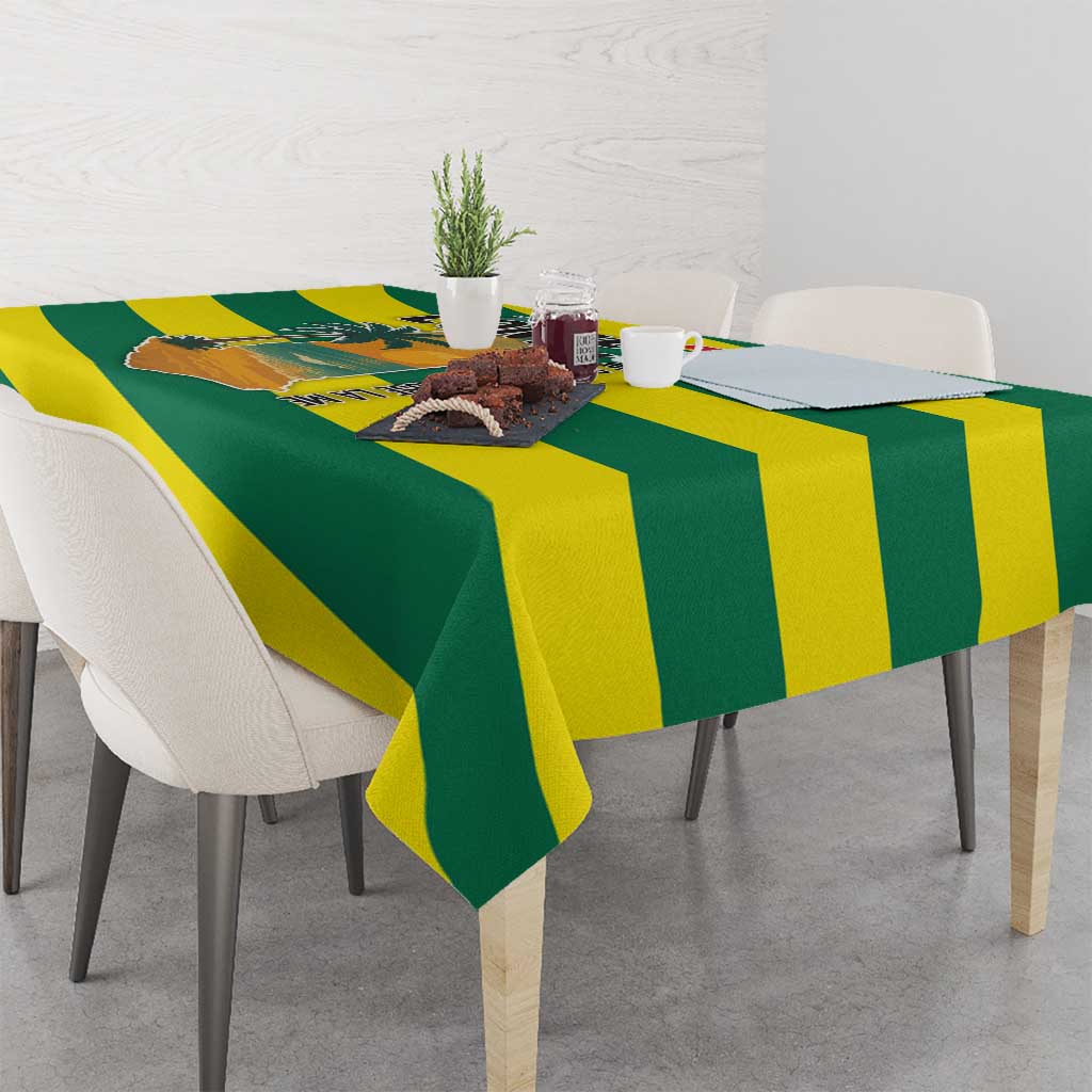 Square tablecloth in green and yellow stripes with island and ocean artwork