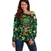 Dark green off-shoulder sweater with skull and shamrock leaf pattern, long sleeves