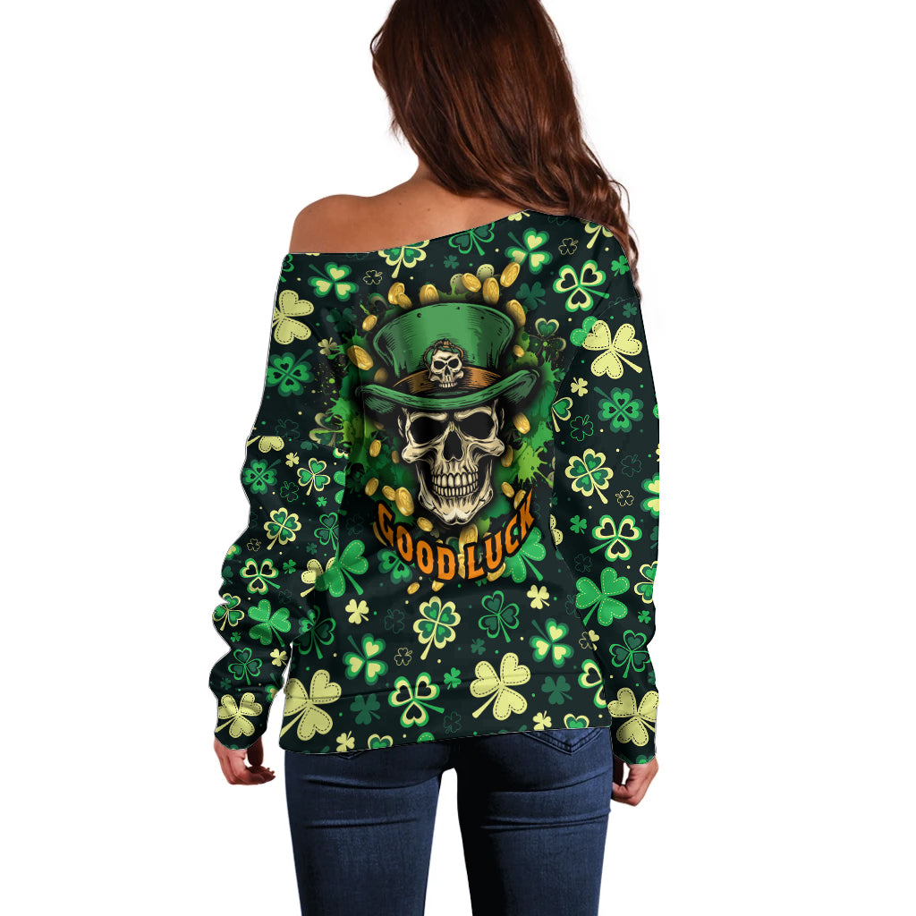 Dark green off-shoulder sweater with back skull graphic and clover leaf pattern, long sleeves