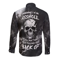 Black long-sleeve button shirt, back features warning text and skull graphic