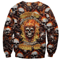 Multicolor skull flame sweatshirt with central fiery skull and arched text design.
