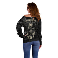 Women's black off-shoulder sweater angled view, skull demon print on back