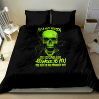 Black duvet with neon green skull and text graphic, paired with two matching pillowcases