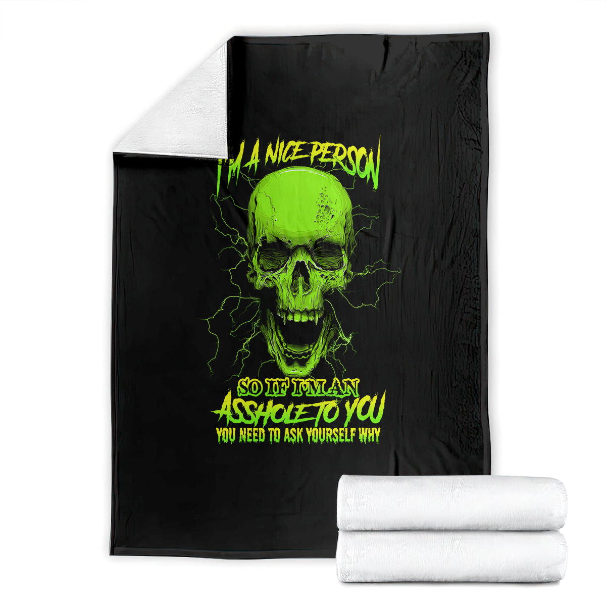 Black skull blanket with neon green skull and text, with folded white towels