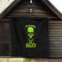 Black quilt hanging indoors, neon green skull graphic centered on diamond quilting