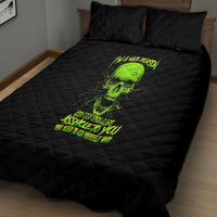 Black quilt bed set with neon green skull graphic and two matching pillows