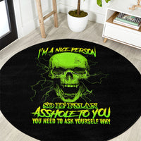 Round black carpet with centered neon green skull graphic and yellow quote