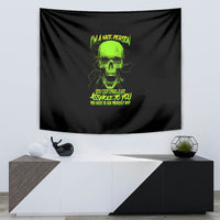 Black rectangular tapestry with neon green skull and message graphic
