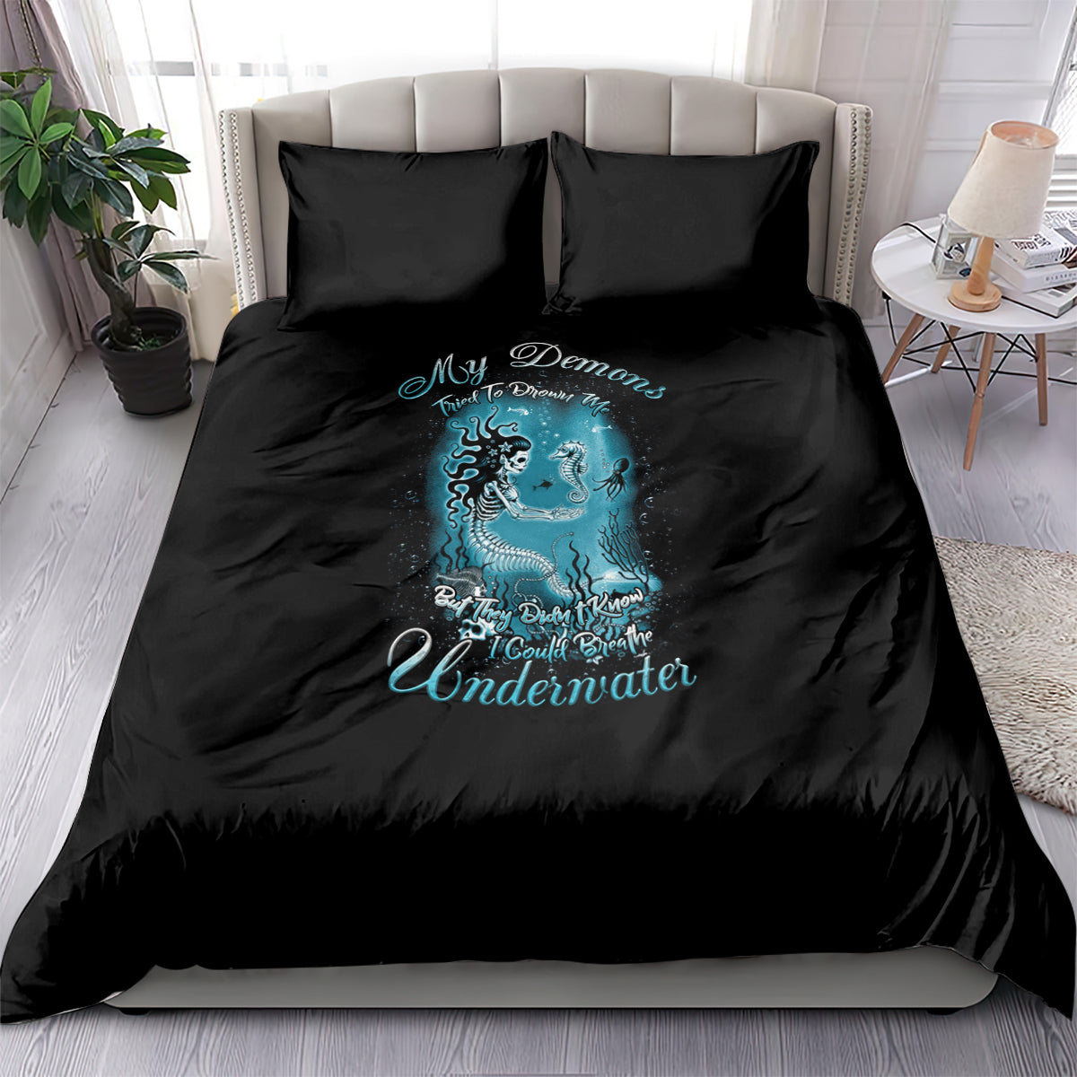 Black mermaid bedding set with blue graphic on duvet and two matching pillowcases