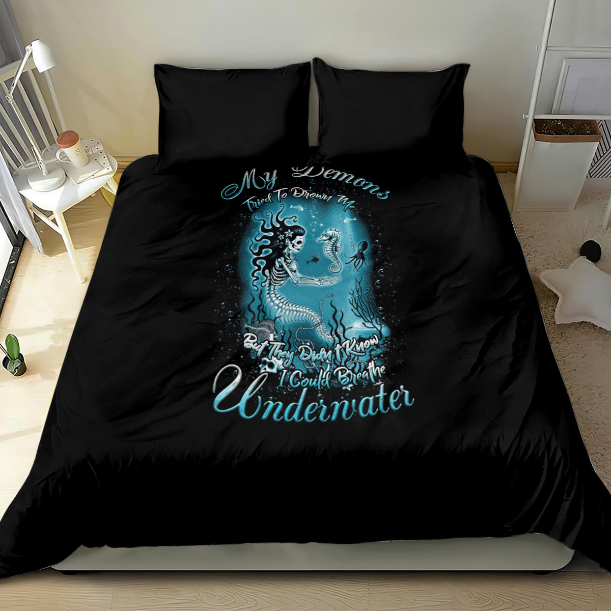Black mermaid bedding set with cyan-blue sea graphic on duvet and matching pillowcases