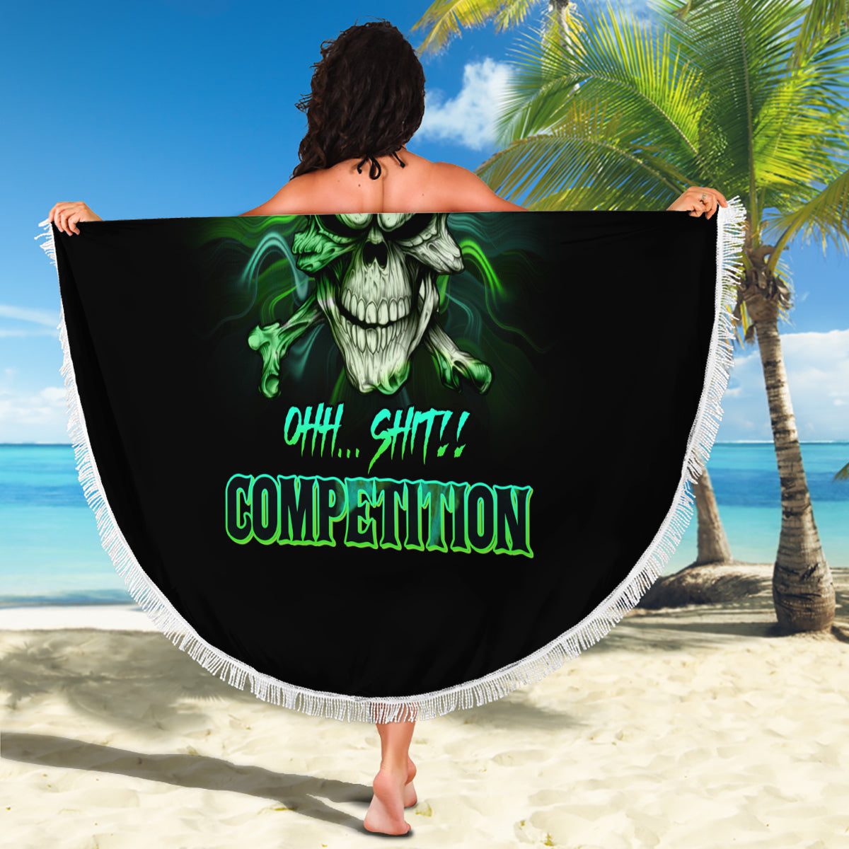 Round black beach blanket with green skull and neon text, white fringe border