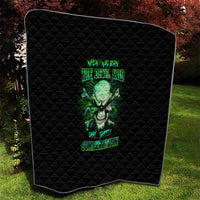 Black quilt with green skull graphic and bright neon text, rounded corner view.