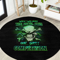 Round black rug with green skull and neon-style text graphic, full view