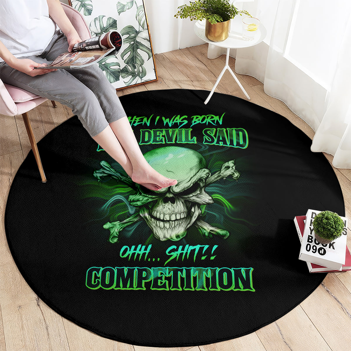 Round black rug with green skull artwork and neon-style text graphic