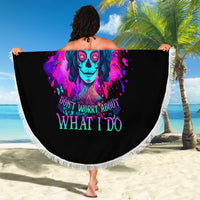 Round black beach blanket with colorful skull floral print, held open with white fringe
