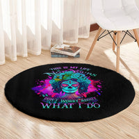 Round black carpet with vivid sugar skull center graphic and 'WHAT I DO' phrase