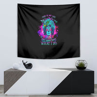 Black wall hanging tapestry with vibrant skull face artwork and "what I do" lettering
