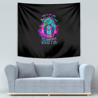 Black fabric tapestry with colorful skull portrait and decorative neon quote text