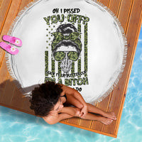 Round white beach blanket with fringed edge and green skull with sunglasses graphic