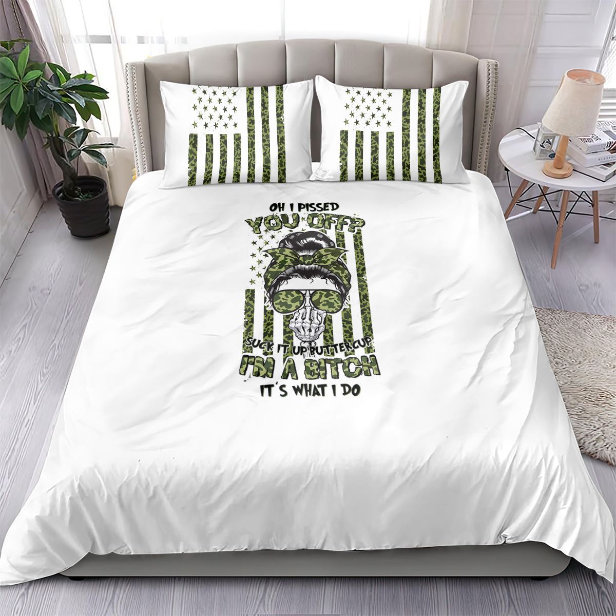White bedding set with green/black graphic comforter and matching pillowcases