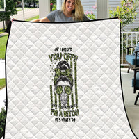 White diamond-quilted throw blanket with central green/black character illustration