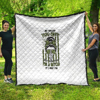 White quilt with diamond stitching and green/black character graphic, large square throw