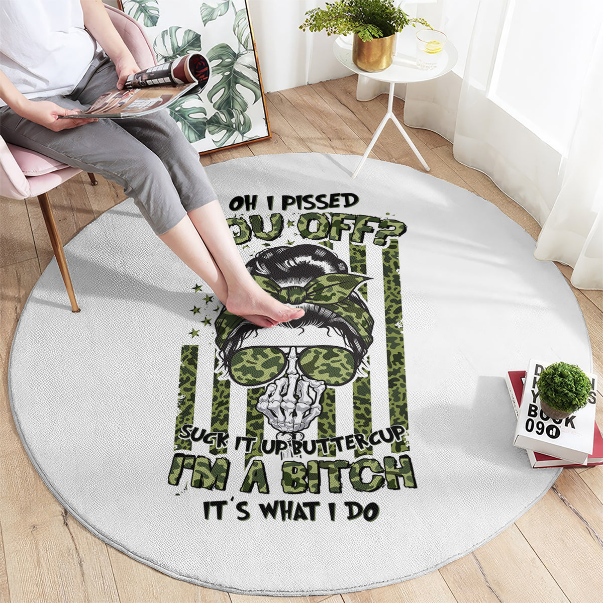 Round gray carpet with green-and-black slogan graphic and round border detail