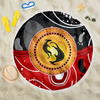 Round beach blanket with black, red, and yellow dot kangaroo design, white fringe