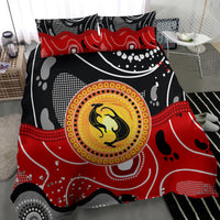Multicolor duvet cover and pillowcases with red waves, white dots, and circular kangaroo emblem