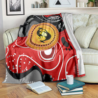Red, black and gray abstract dot art kangaroo blanket with yellow circular emblem