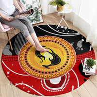 Round Aboriginal-style dot art carpet with red base, yellow kangaroo motif, black details