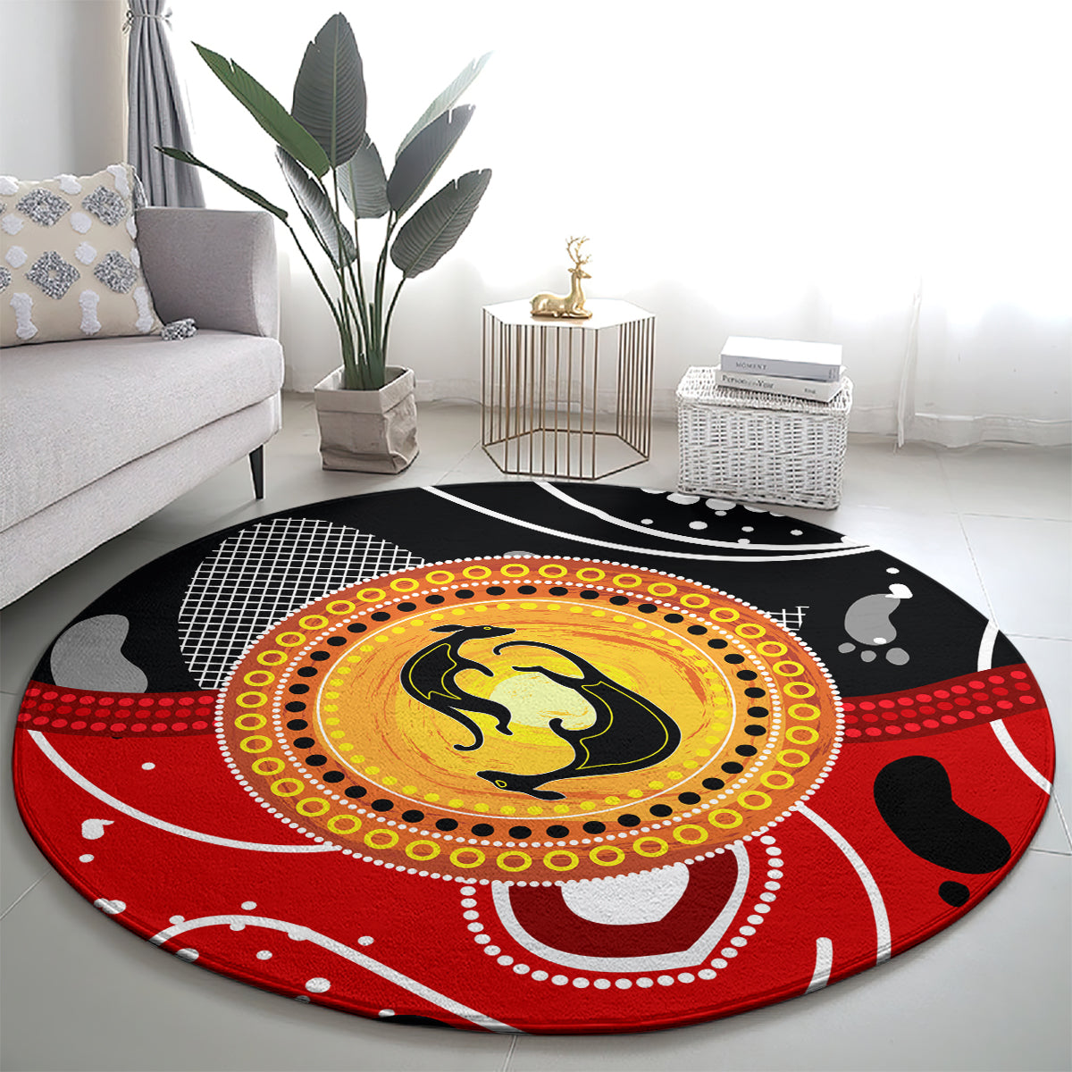 Round red-and-black dot art rug featuring a yellow kangaroo emblem in a circular border
