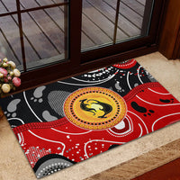 Abstract dot-art kangaroo rubber doormat in red and black at doorway
