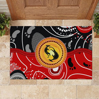Rectangular red and black abstract kangaroo dot-art doormat with yellow center medallion