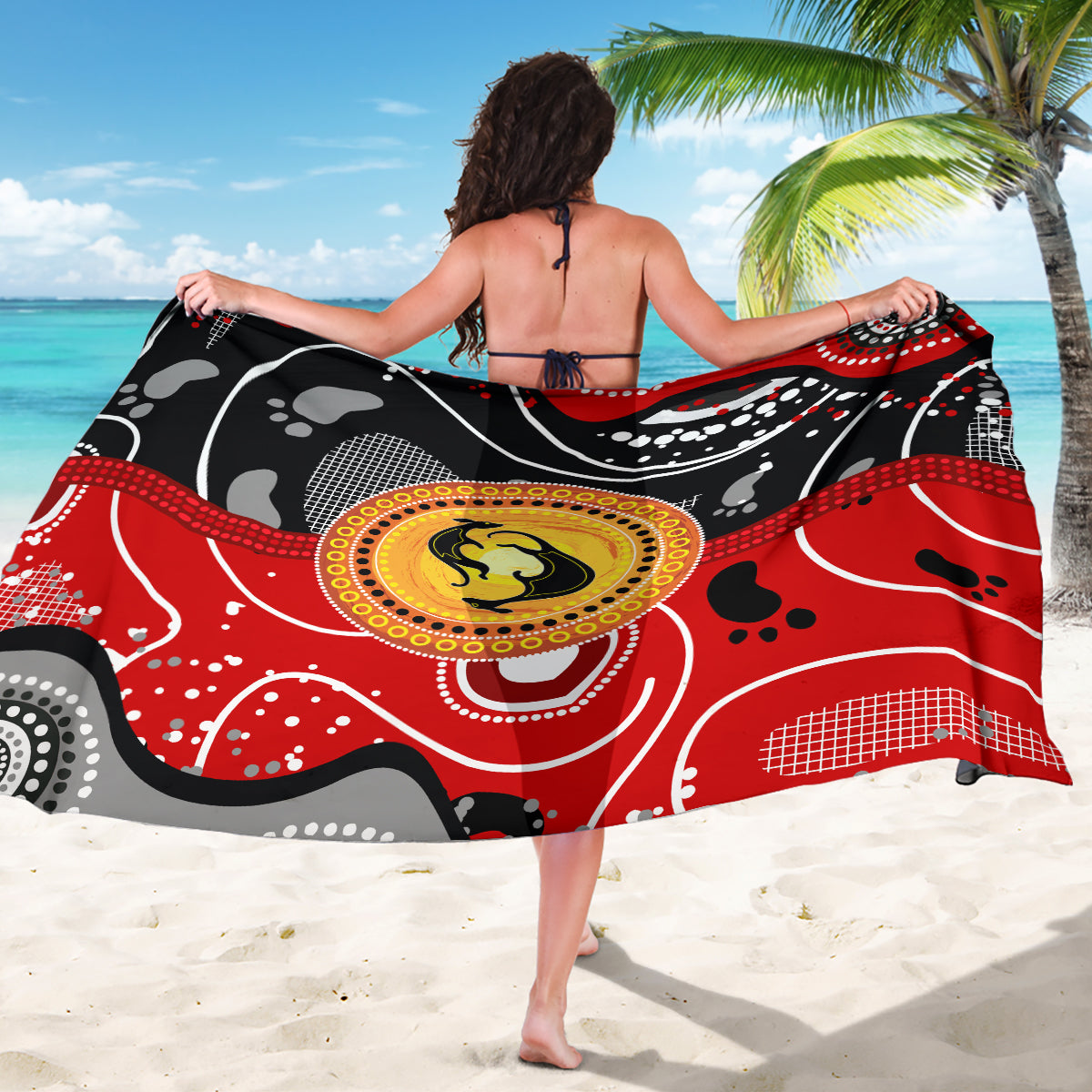 Abstract kangaroo dot-art sarong draped on the back, black, red, white and yellow design