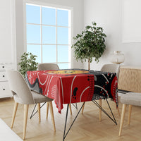 Red and black abstract tablecloth with white curves and round dot-art center for dining