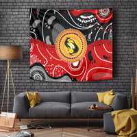 Multicolor Aboriginal dot art tapestry showing kangaroo silhouette in a round gold emblem