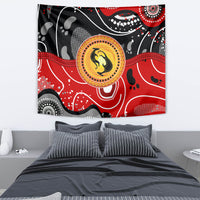 Multicolor Aboriginal-style tapestry with red and black dot patterns plus central kangaroo emblem