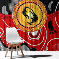 Close view of red, black, and yellow dot art curtain showing circular kangaroo motif