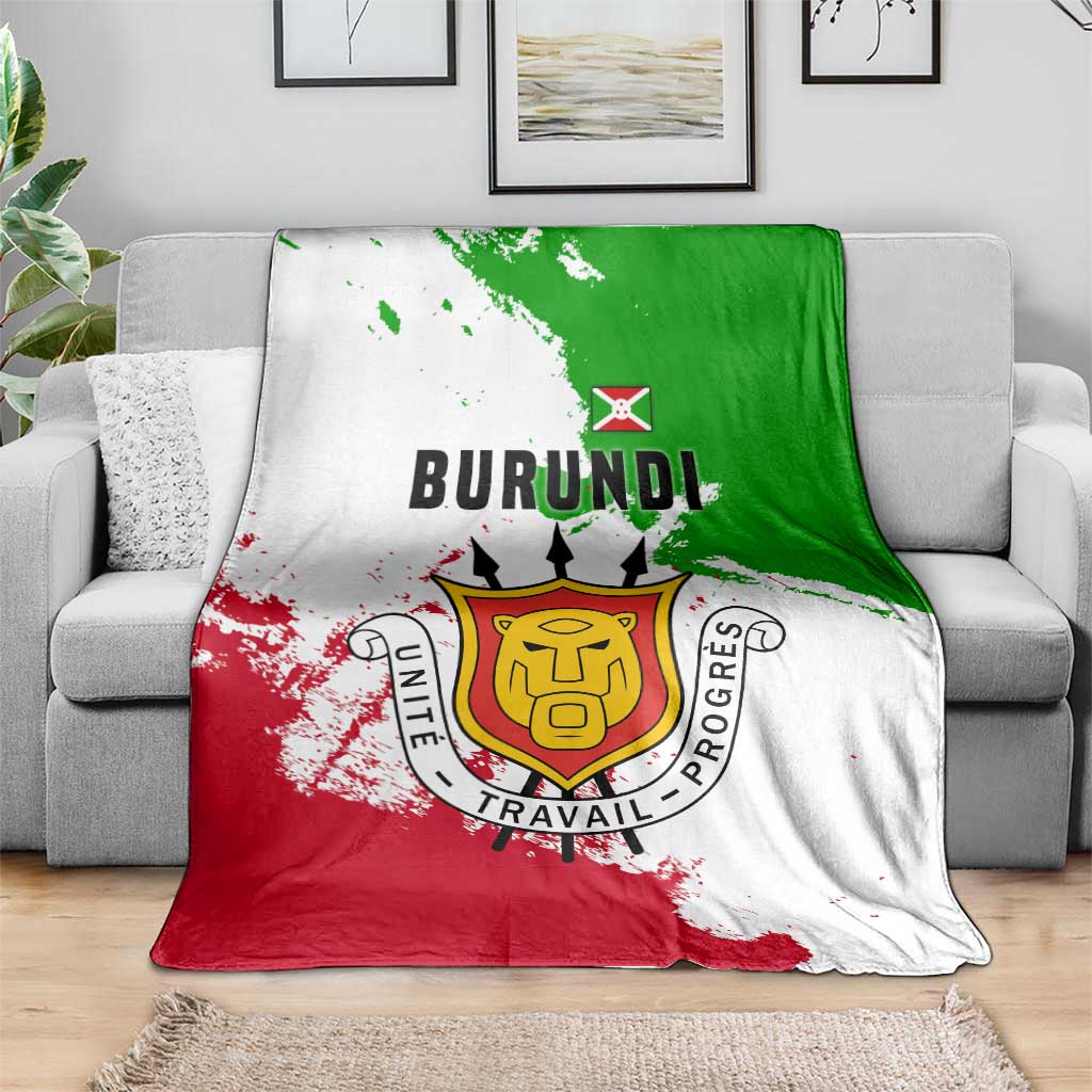 Burundi flag blanket on gray sofa with green-red-white diagonal flag design