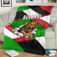 Burundi-themed lion throw blanket on sofa with diagonal flag stripes and BURUNDI text