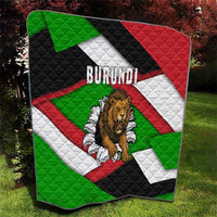 Quilt blanket with BURUNDI lettering, roaring lion center graphic, and red green black white diagonals