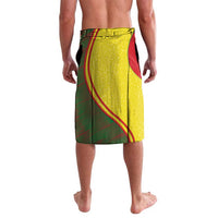 Mens lavalava sarong featuring yellow panel with green plaid and red curved trim