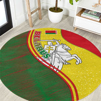 Round folk patterned carpet with red, yellow, green crest and knight horse graphic