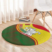 Round carpet with central yellow emblem and knight-on-horse illustration, red green edge