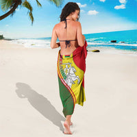 Red, green, and yellow wrap sarong with Belarus crest and knight graphic on back