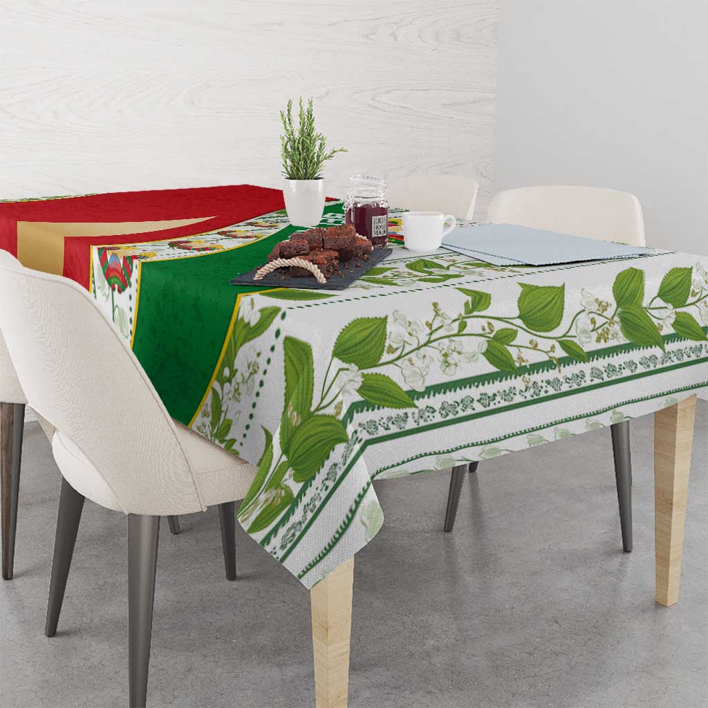 Belarus folk tablecloth with green leaf pattern, lace-style border, and emblem details